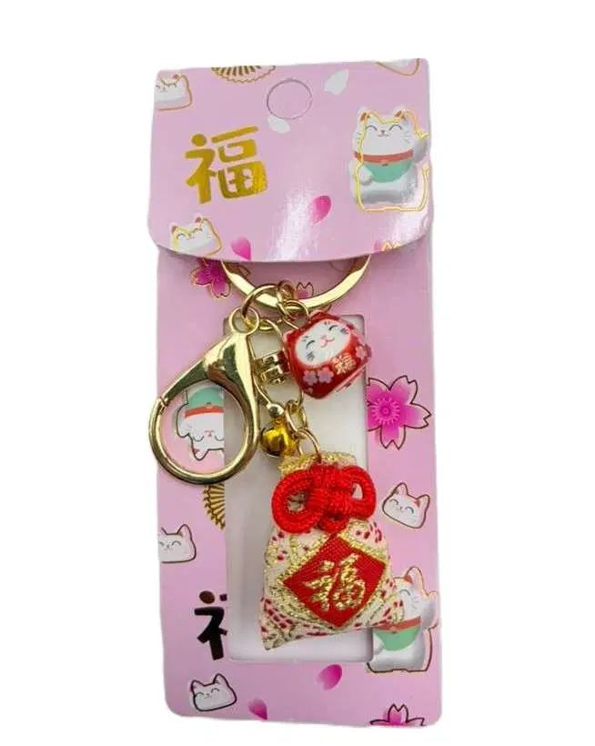 19 Lucky Cat with Red Fortune Pouch Keychain - Image 1